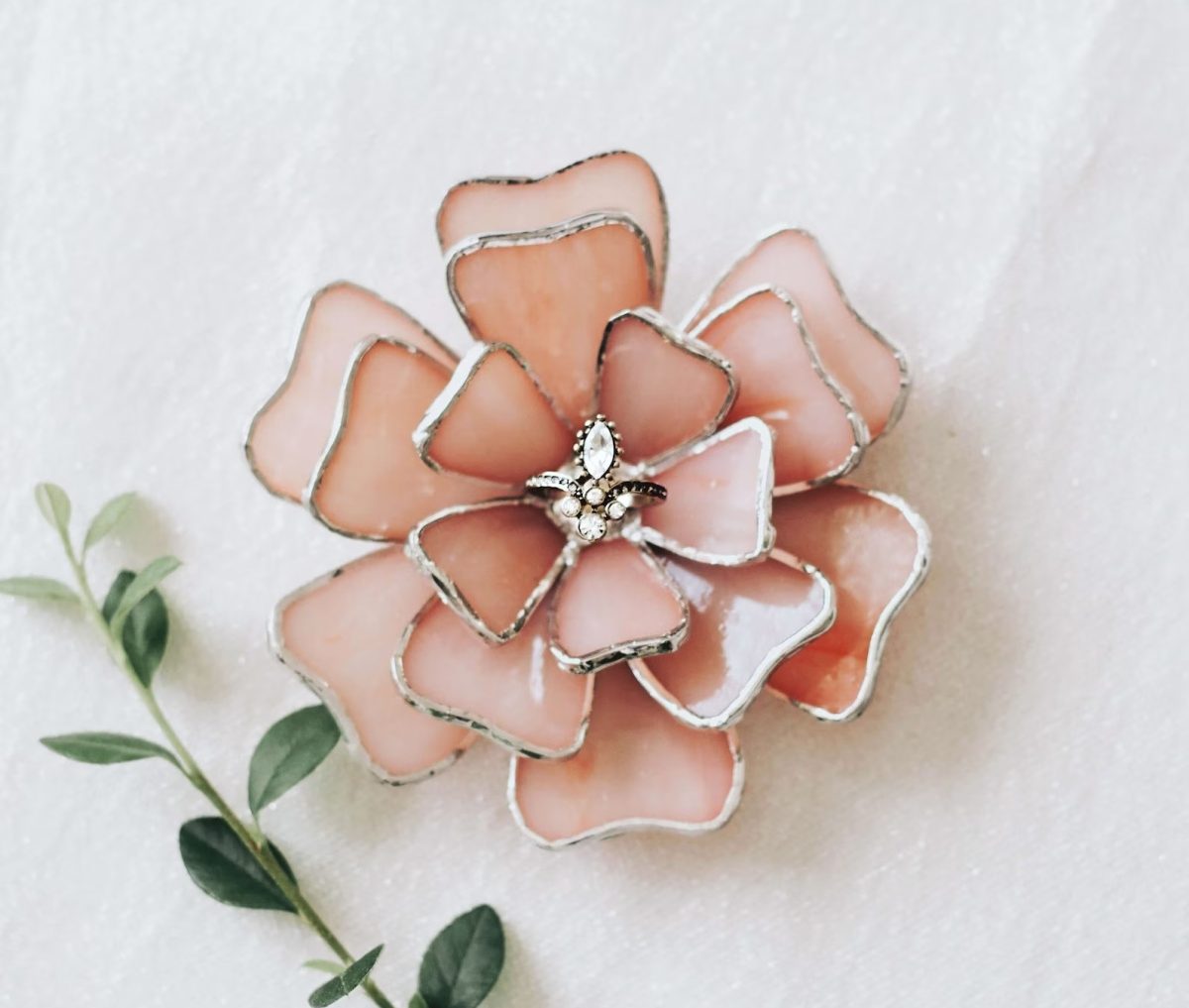 this Glass Flower Engagement Ring Holder is among our favorite unique bridal shower gifts