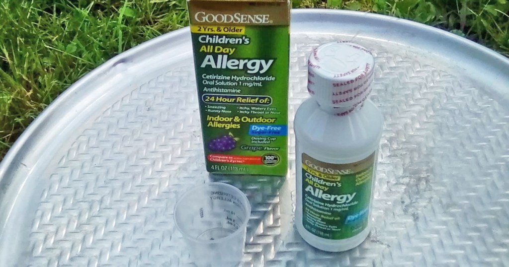 box, cup, and bottle of GoodSense Children’s All-Day Allergy Liquid