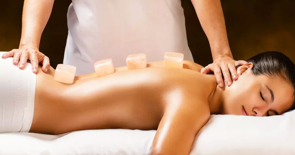 woman getting a stone massage