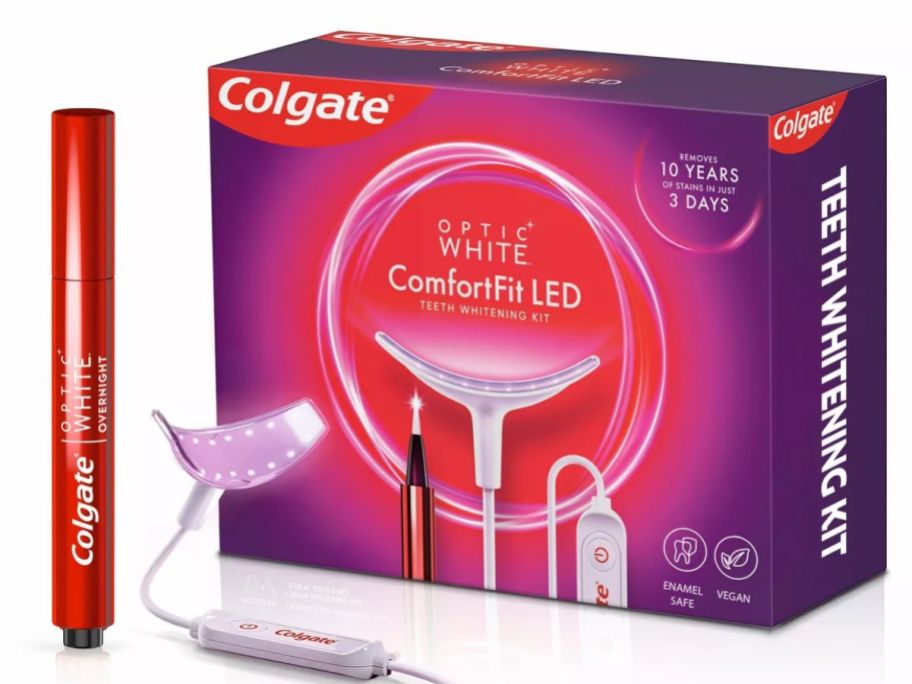 box for a Colgate Flex LED Tooth Whitening System with the brush tool and LED mouth tray laying beside it