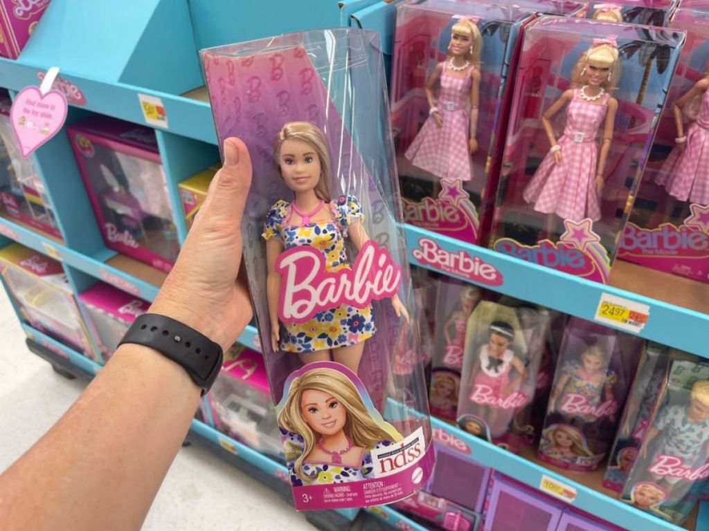 Barbie Fashionistas Doll #208, Barbie Doll with Down Syndrome Wearing Floral Dress in woman's hand at Walmart