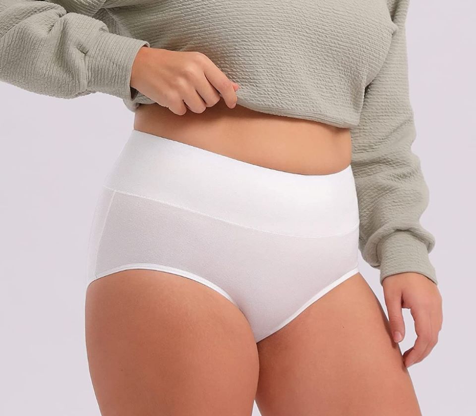 Woman wearing a pair of white underwear