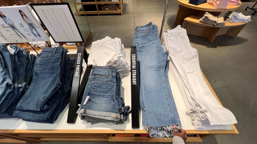 Display of jeans on a table at J. Crew