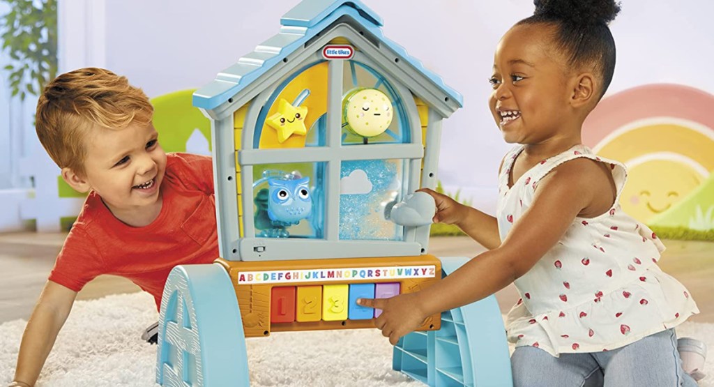 Kids play with the Little Tikes Learn & Play Watch & Learn Window