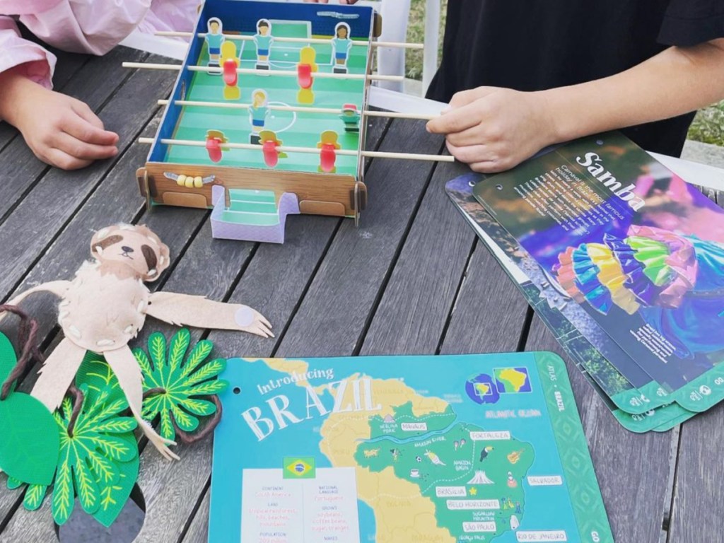 kids playing outside with Kiwi Crate about Brazil