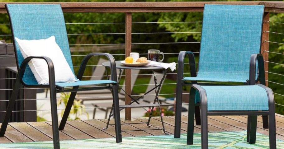 Sonoma patio chairs and folding table on a deck