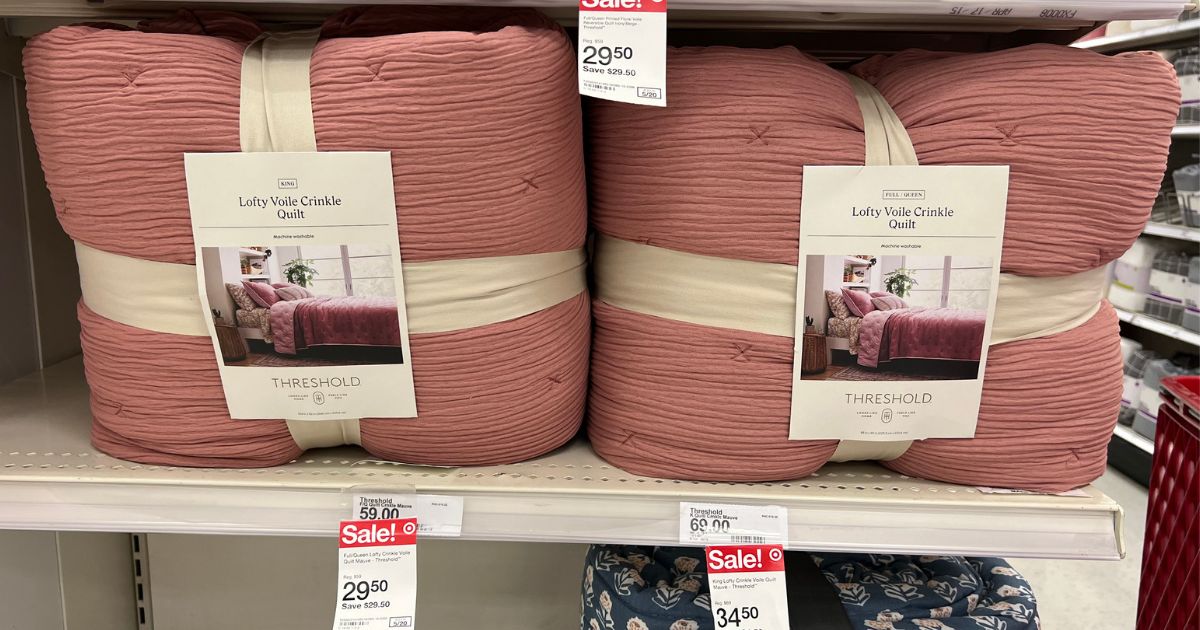 2 mauve threshold Lofty Crinkle Voile Quilts in queen and king sizes on a store shelf in Target