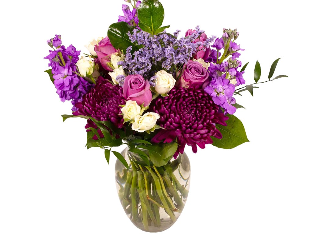 bouquet with assorted purple flowers in a vase
