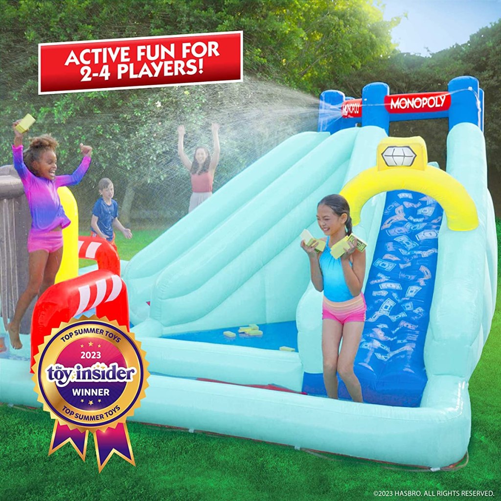 Kids playing on an inflatable waterpark