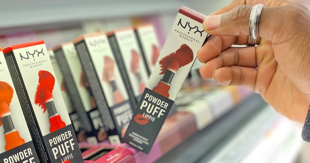 hand holding the box for NYX Powder Puff Lippie Lip Cream in store