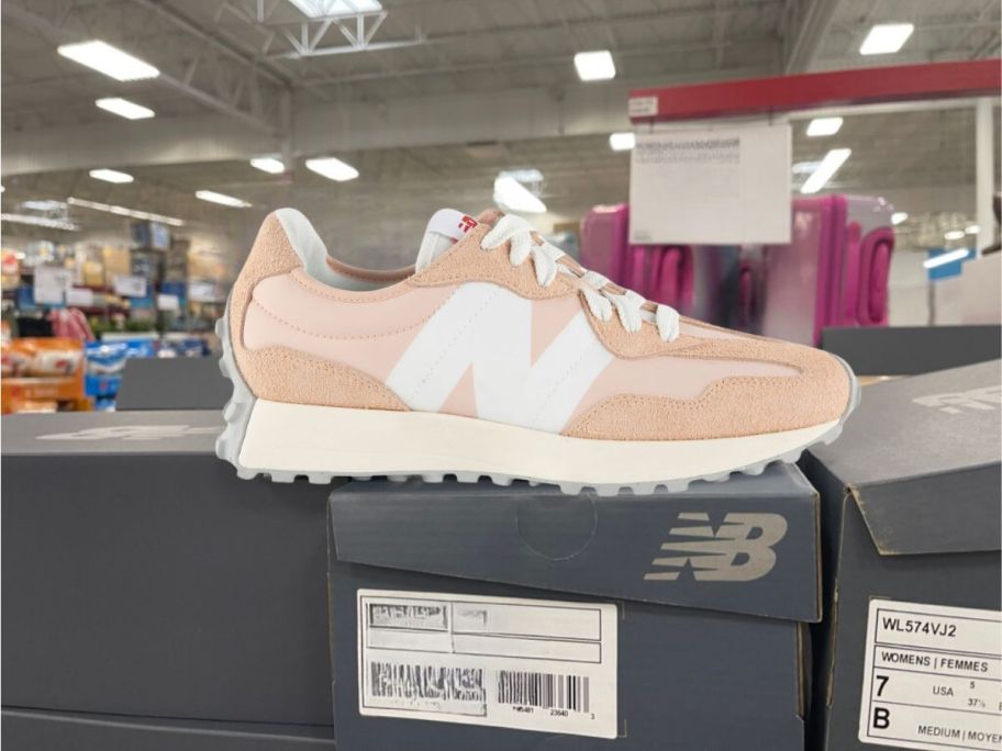 New Balance 327 Women's Shoes on shoe box in store