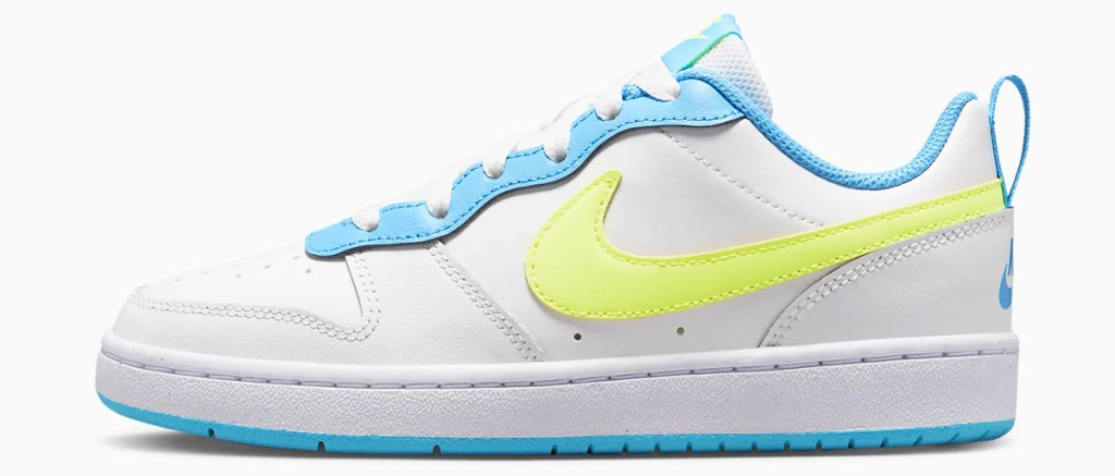white, blue, and yellow nike sneaker