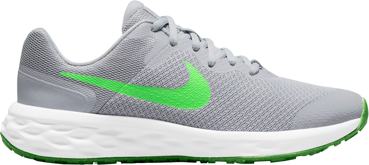light grey and bright green nike running shoe