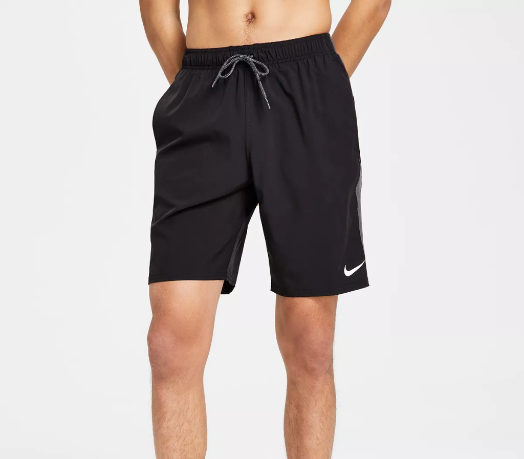 man wearing nike swim trunks which are some of the best mens swim trunks for 2023
