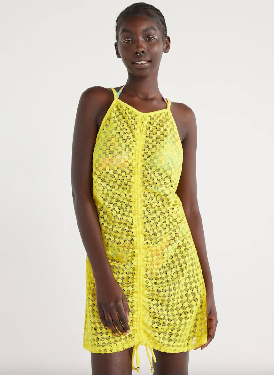 stock photo of model wearing neon yellow swimsuit cover up walmart brand