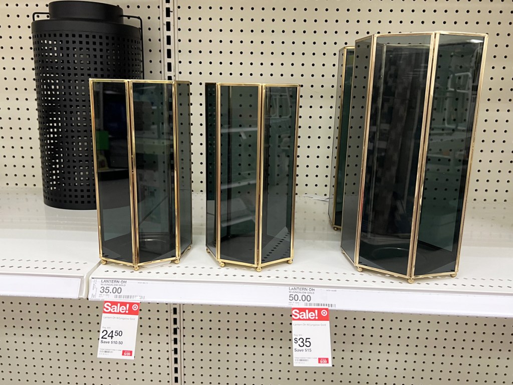 dark glass lanterns on store shelf