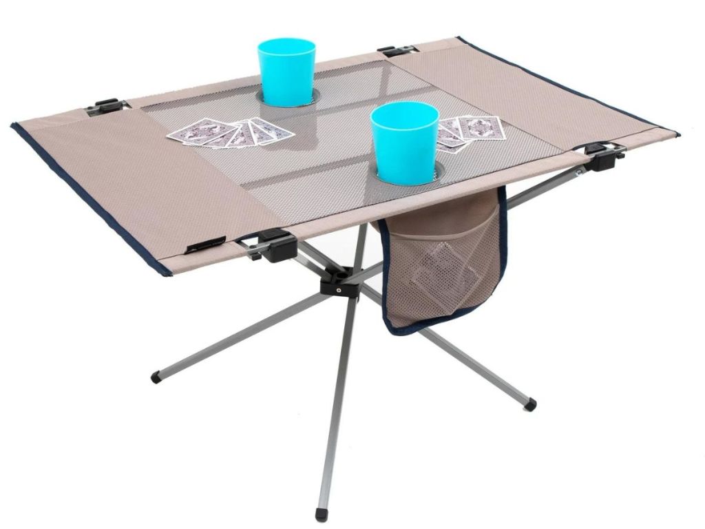 Ozark-Trail-Portable-Table طاولة السفر المحمولة عالية التوتر من Ozark Trail بسعر 9.97 دولارًا أمريكيًا فقط، ويتم شحنها على موقع Walmart.com (24.94 دولارًا أمريكيًا)