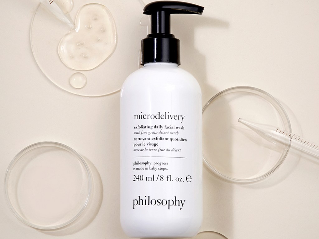 bottle of Philosophy The Microdelivery Exfoliating Daily Facial Wash with bubbles around it