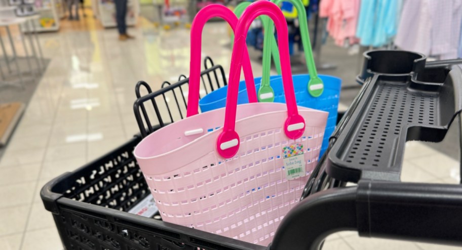 Pink and blue beach tote bags inside of Kohls cart
