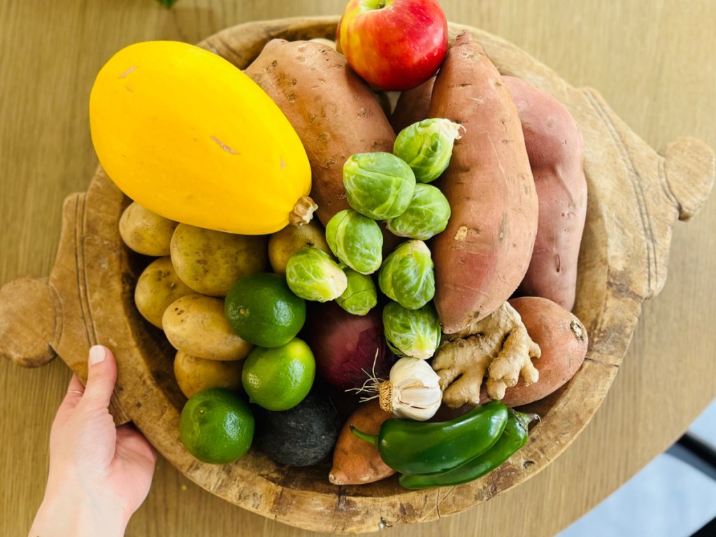 colorful produce in wooden bowl