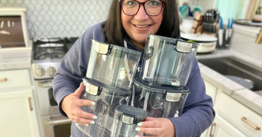woman holding a set of Prokeeper+ Storage Containers