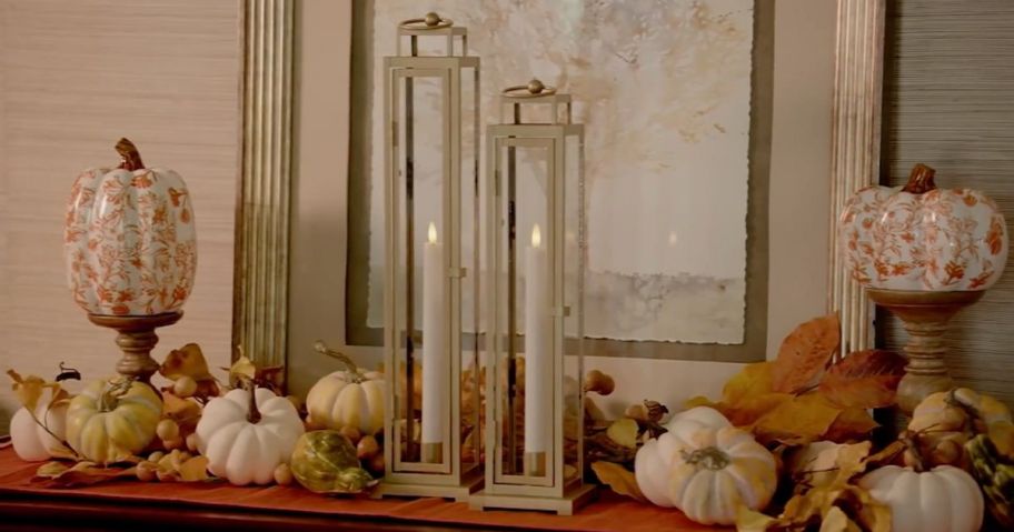 Remote control Lanterns on a Mantle with fall decor