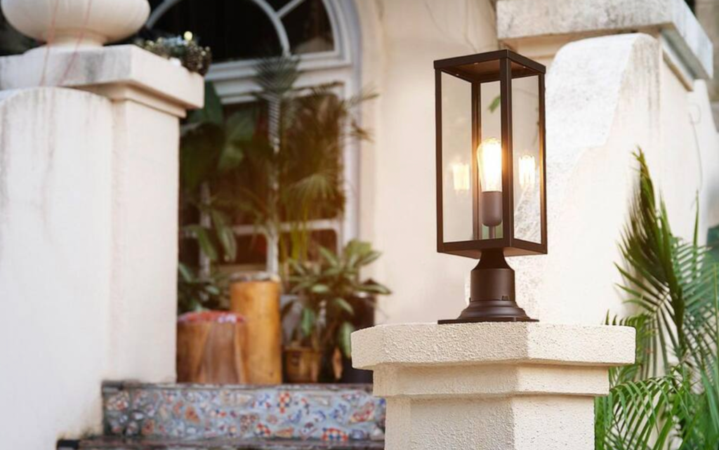 outdoor light sitting on column by front steps