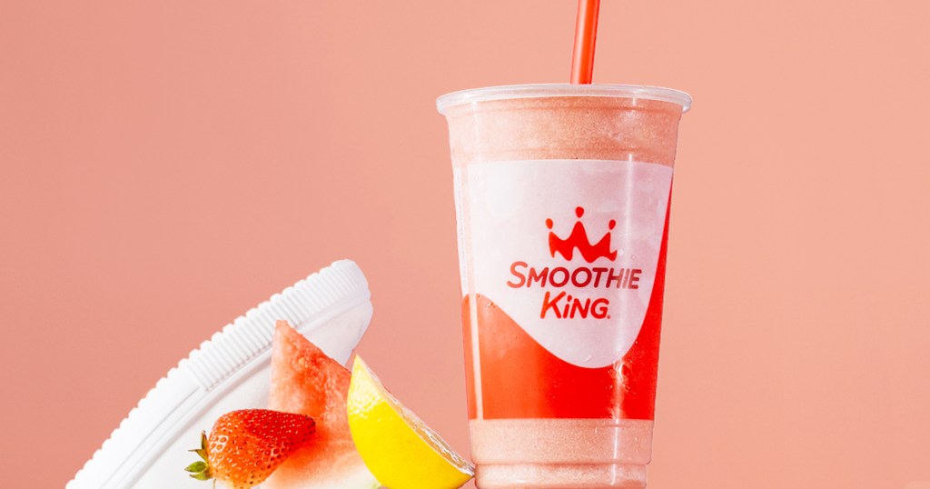 pink smoothie king smoothie with strawberry, watermelon, and lemon slices