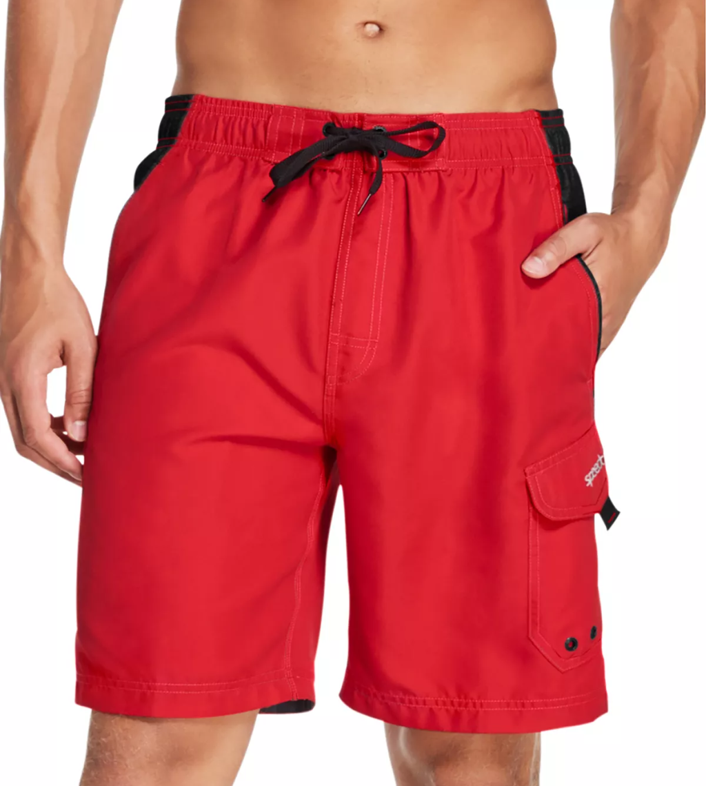man wearing red speedo mens swim trunks