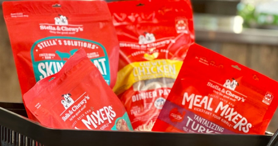 red bags of Stella & Chewy's dog food in shopping basket