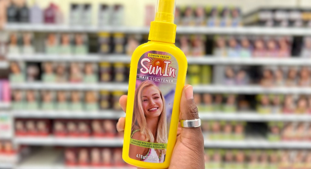 Sun In Lemon Fresh Hair Lightener in woman's hand at the store