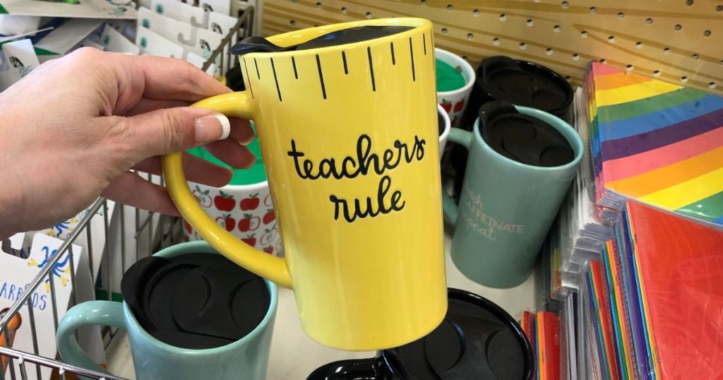 mug with yellow ruler print and "Teachers Rule" printed on it