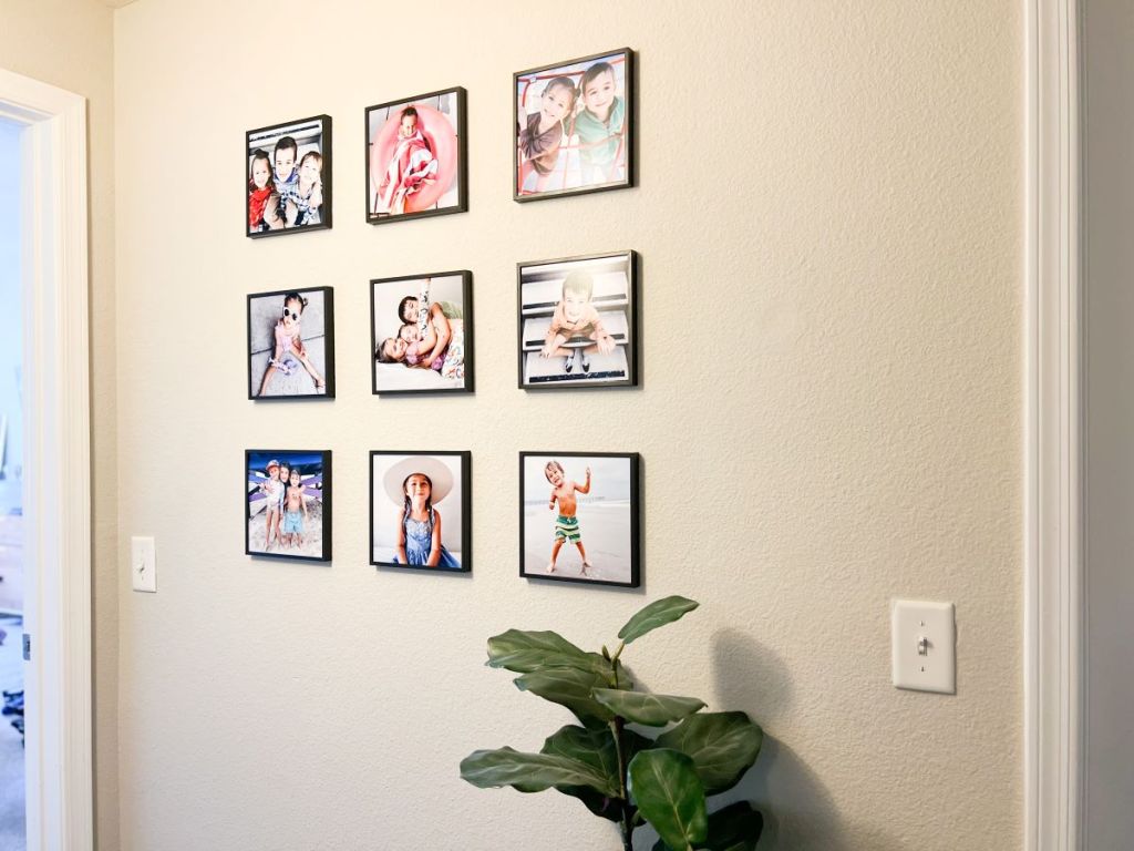 Nine Tilepix photos hanging on a wall