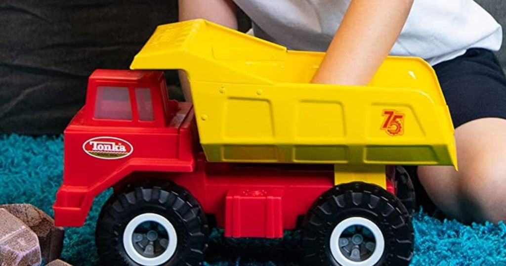A red and yellow dump truck 