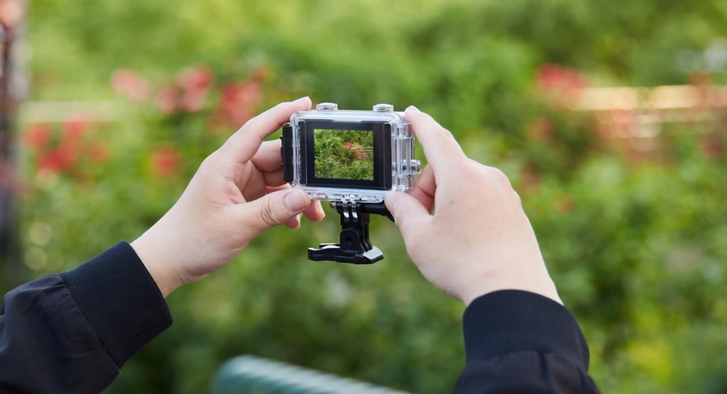 Vivitar 4K Ultra HD Action Camera in a mans hands