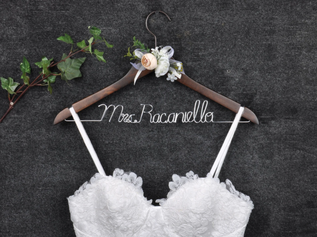 A wedding dress hanger like this one is one of the best personalized bridal shower gifts