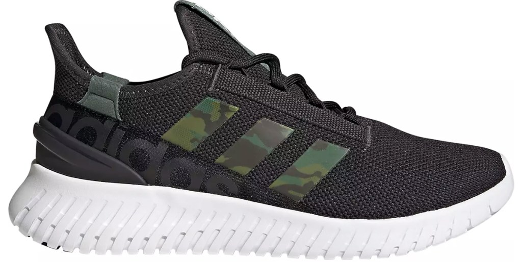 black adidas shoe with camo print stripes