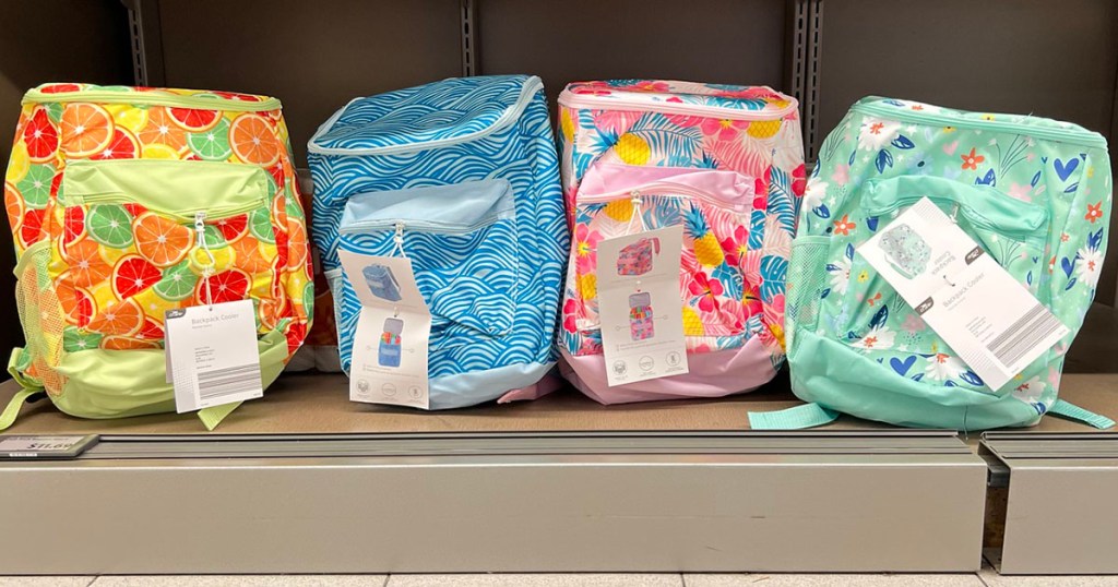 4 backpack coolers on shelf