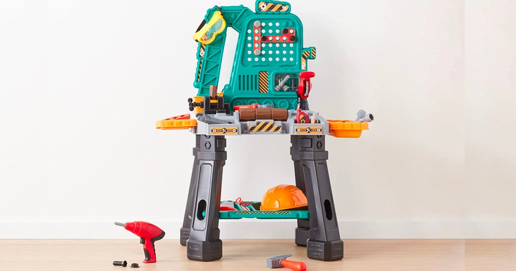 amazon basics kids workbench with play tools on floor