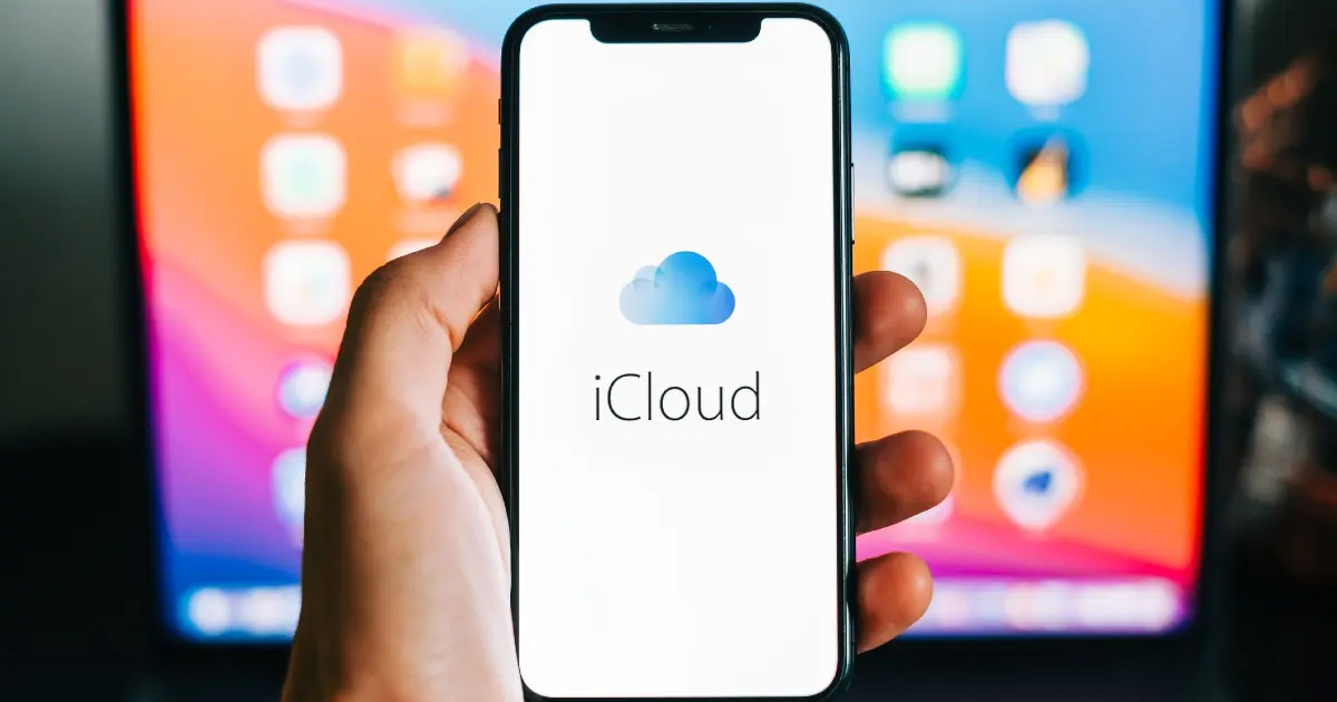 hand holding phone with icloud app on it