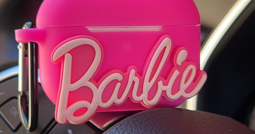 Barbie airpods case on steering wheel