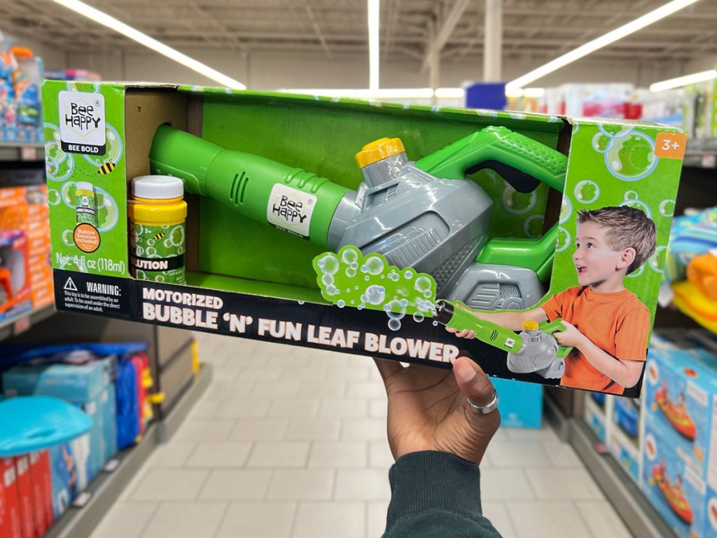 hand holding green bee happy leaf bubble blower