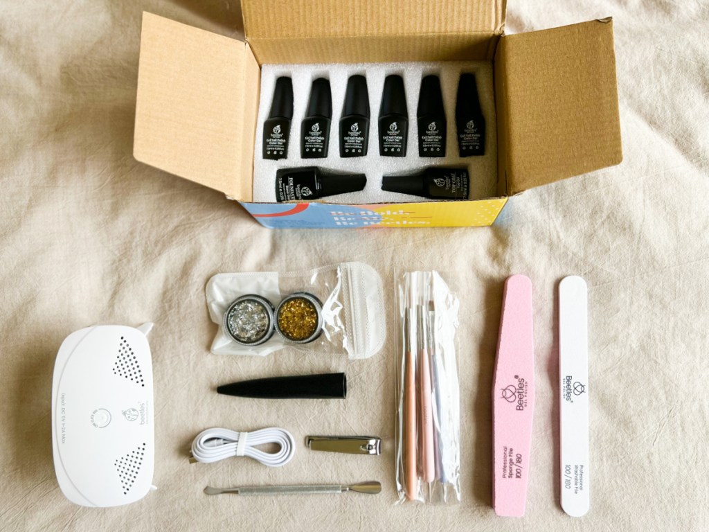 gel nail polish starter kit with nail accessories spread out