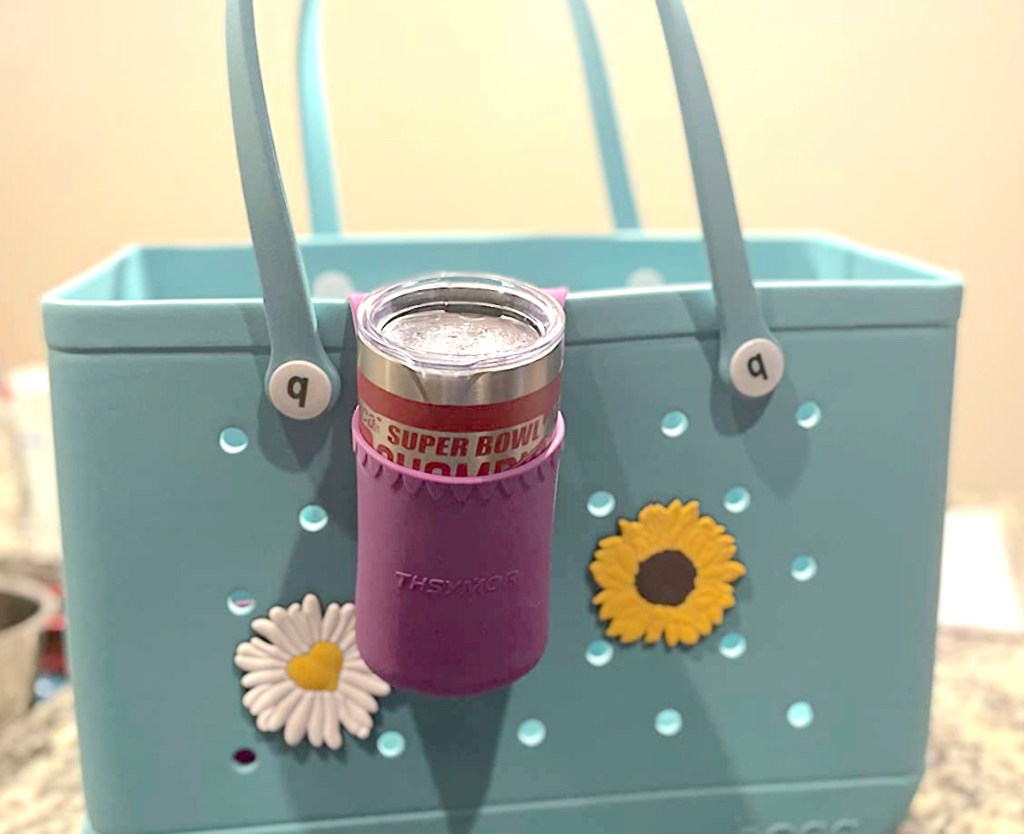 purple cup holder with tumbler on blue bogg bag