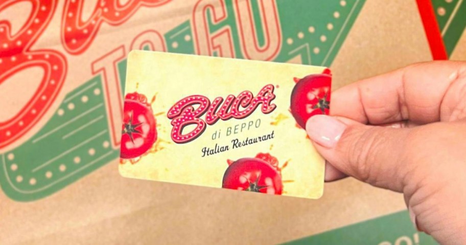 hand holding buca di beppo gift card