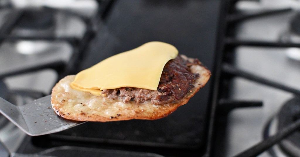 burger on a tortilla with american cheese