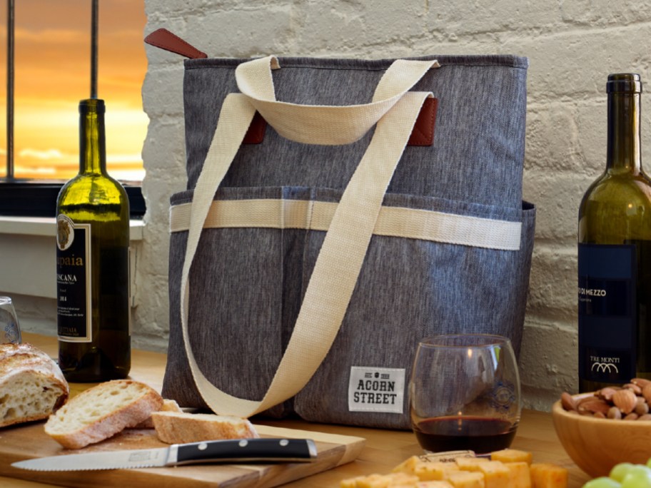 cooler tote bag with wine and cheese around it