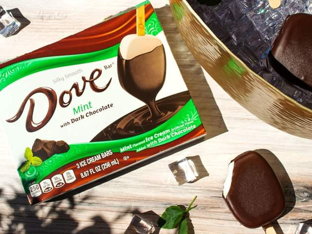 dove ice cream bars mint package with ice cream bar sitting next to it