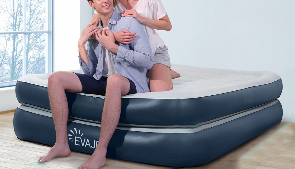 two people sitting on evajoy air mattress