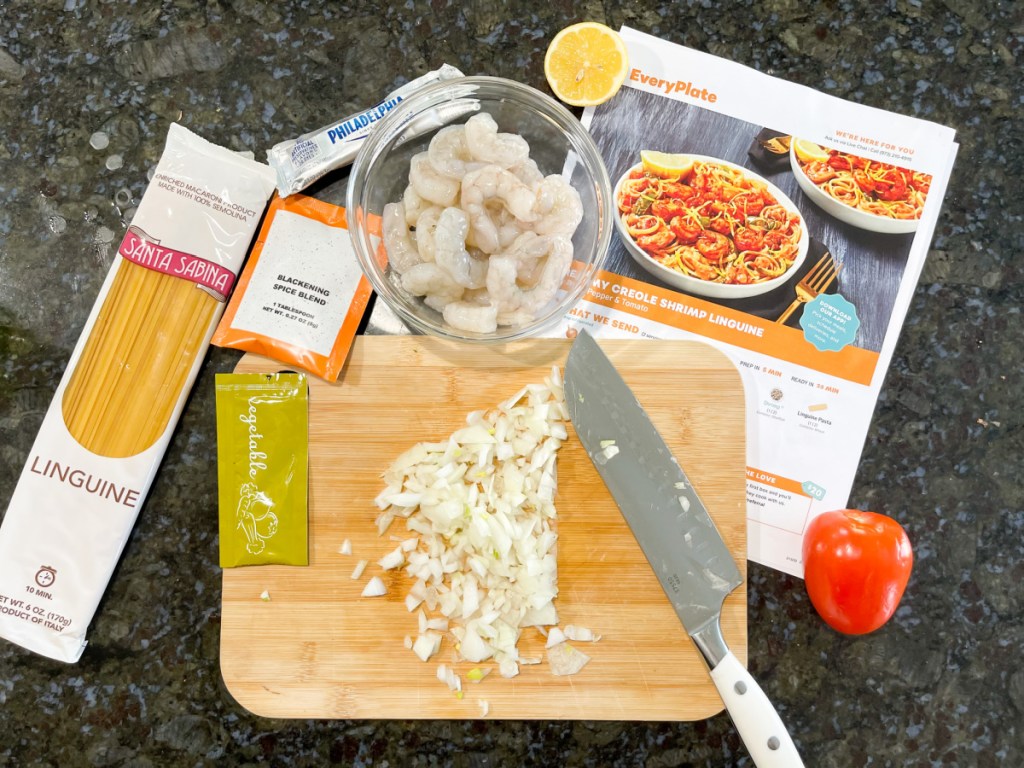 recipe card next to ingredients and knife